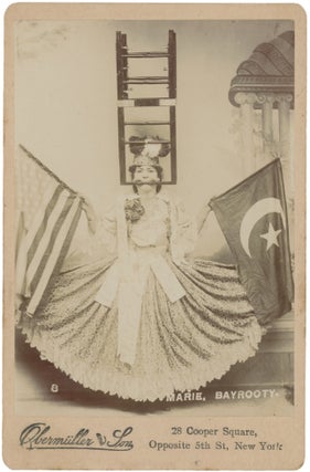 Item #List114 Cabinet Card of Marie Bayrooty in Stunt Pose Holding American and Turkish Flags,...