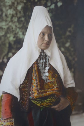 Seven Hand-Colored Photographs of Subjects and Architecture in Jerusalem, c. 1890s-1920s.