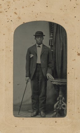 Item #List1808 Portrait of a Young African-American Man With a Hat and Cane, 1860s - 1870s....